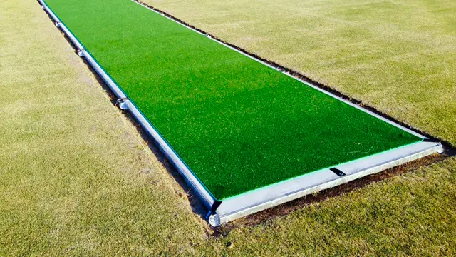Drop-in cricket wicket