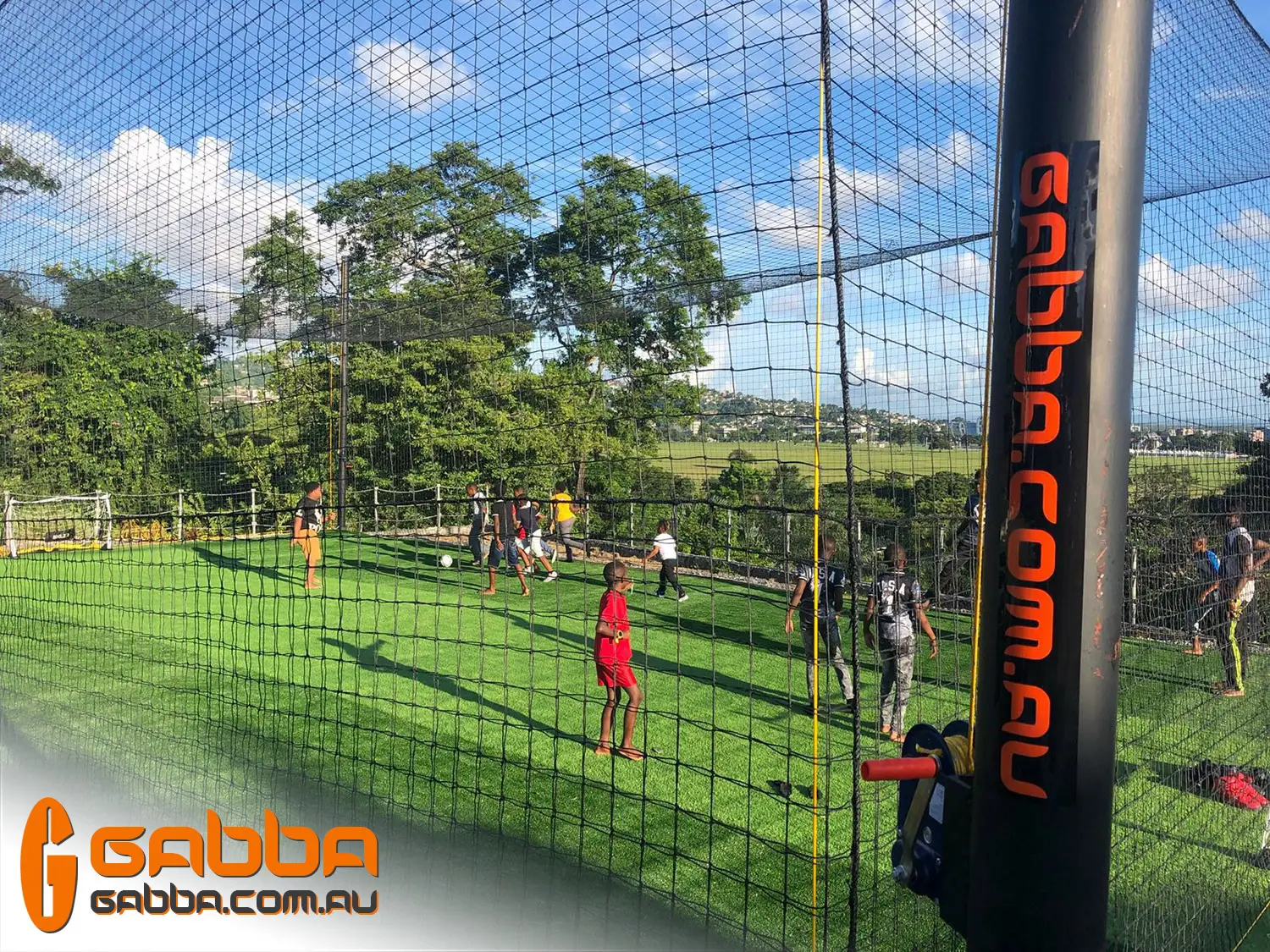 Outdoor futsal enclosure netting in use