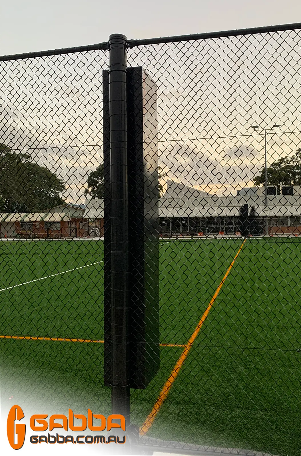 Powder coated net storage cabinet mounted on a barrier netting post